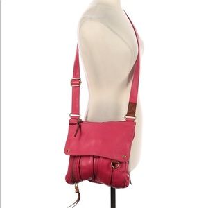 Pink fossil leather cross body bag